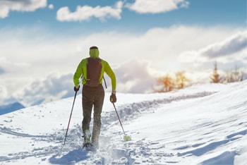 Man walking in snow shoes